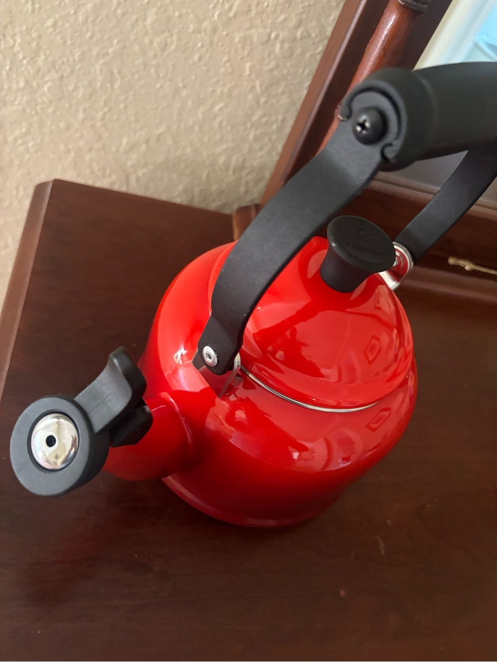 Le Creuset Demi Tea Kettle in the color Cerise (Cherry Red). ® - Picture 6 of 13